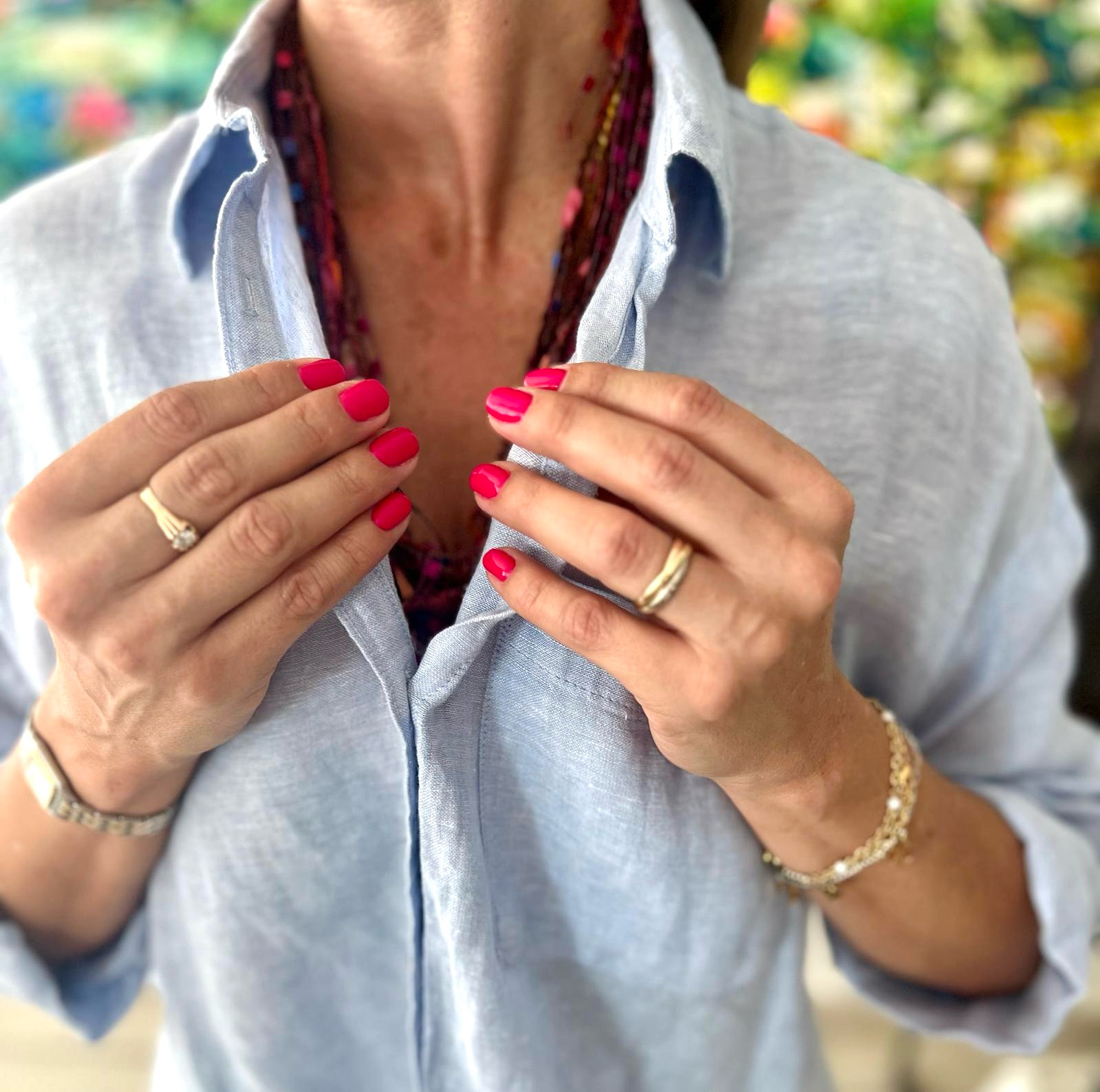 Bright red manicure.